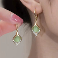 Aretes de Cristal Ojo de Gato Estilo Coreano