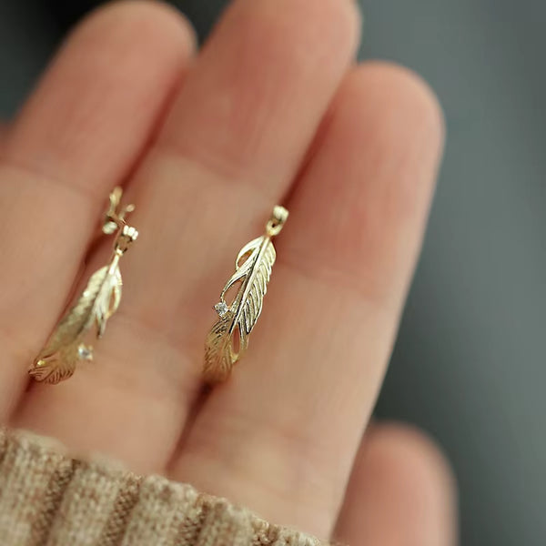 Aretes de Aro con Plumas Huitan