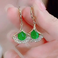 Aretes de Cristal Ojo de Gato Estilo Coreano