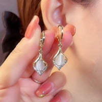 Aretes de Cristal Ojo de Gato Estilo Coreano