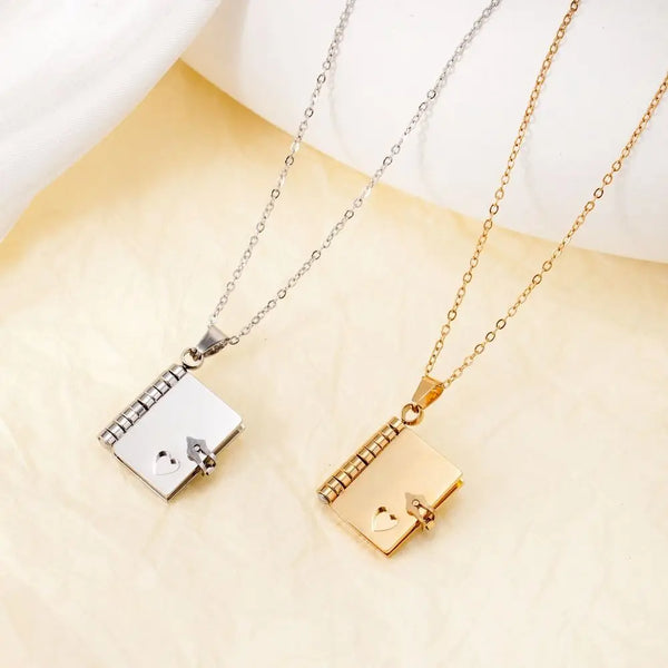 Collar de Pareja Libro Corazón en Acero de Titanio